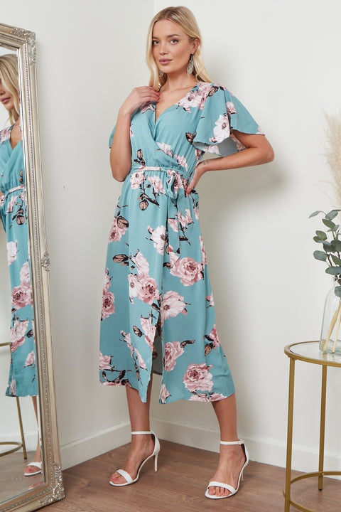 Image of Lilura London's Angel Sleeves Midi Wrap Dress in a vibrant green floral print