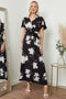 Image of a black floral print wrap front maxi dress from Lilura London
