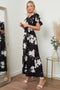 Image of a black floral print wrap front maxi dress from Lilura London