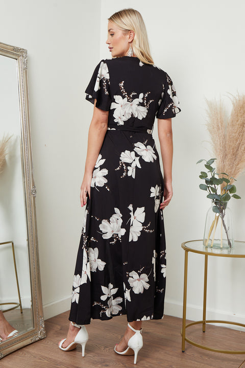 Image of a black floral print wrap front maxi dress from Lilura London