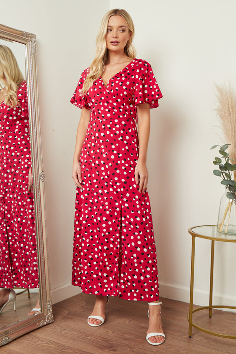 Red and black polka dot wrap front maxi dress from Lilura London