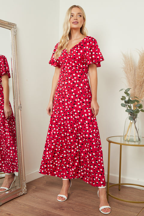 Red and black polka dot wrap front maxi dress from Lilura London