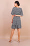 Flute Sleeve Mini Skater Dress In Black Floral Print - Lilura London