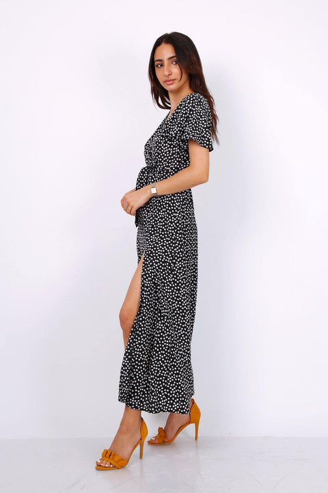 Wrap Front Split Leg Maxi Dress In Black Daisy Dot Print - Lilura London